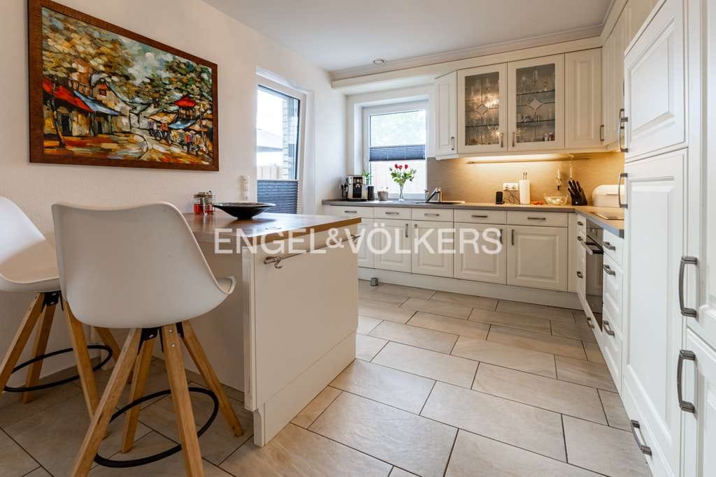 Immobilie in Esterwegen - Familienfreundlicher Bungalow mit Terrassen, Gartenblick & viel Platz - Bild 2