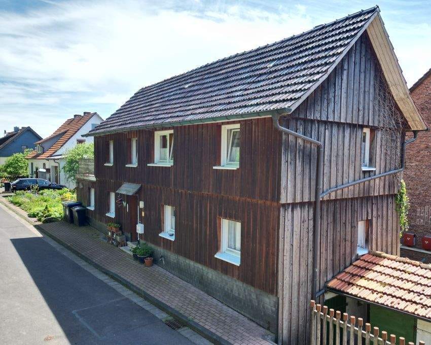Immobilie in Waldkappel - kleines Fachwerkhaus mit massivem Anbau, kleinem, gemütlichen Garten und PKW-Stellplatz in ruhiger Ortsrandlage - Bild 0