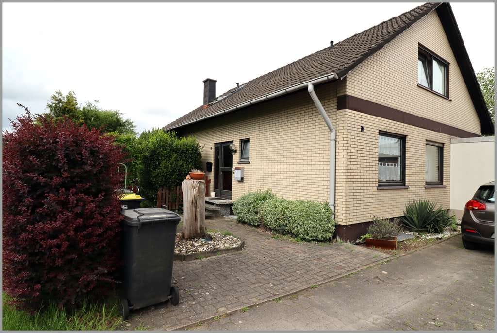 Immobilie in Dissen - Einfamilienhaus mit Einliegerwohnung in ruhiger Lage - Bild 1