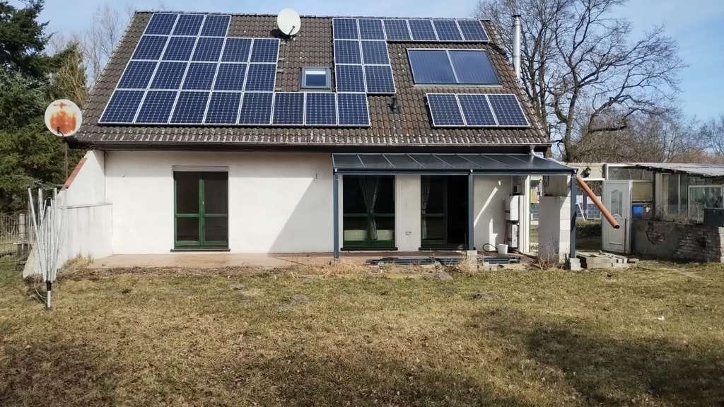Immobilie in Ducherow - „Modernes Familienhaus mit PV-Anlage, Kamin &amp; großer Terrasse in ruhiger Lage“ - Bild 1