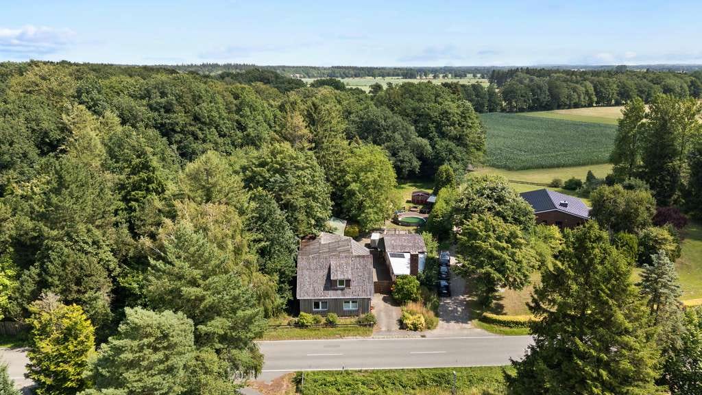 Immobilie in Hartenholm - Familienfreundliches Einfamilienhaus mit Einliegerwohnung auf weitläufigem Grundstück in Hartenholm - Bild 1