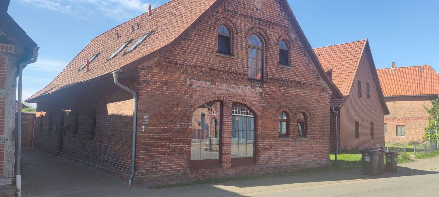 Immobilie in Bücken - Anlageobjekt mit 9 WE innerhalb eines 3-teiligen Gebäudekomplexes im Kernbereich von Bücken zu verkaufen! - Bild 1