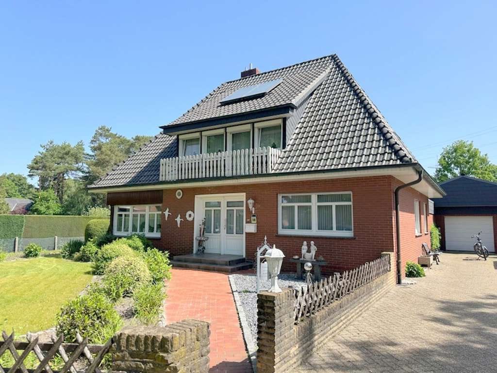 Immobilie in Meppen - Gepflegtes Wohnhaus mit Einliegerwohnung & 2 Garagen in Meppen-Hüntel - Bild 0