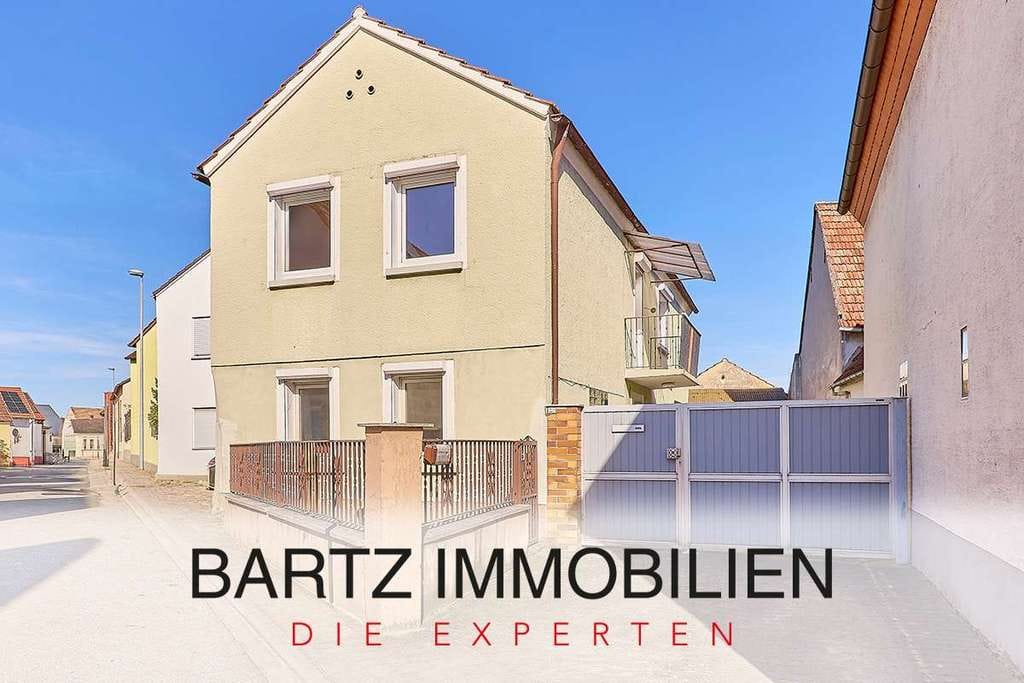 Immobilie in Haßloch - Einfamilienhaus mit weitläufigem Garten und privatem Innenhof - Bild 0