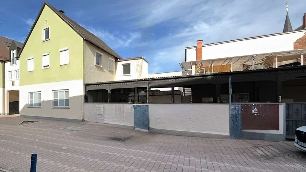 Immobilie in Dudenhofen - Renditeobjekt als prägendes Mosaik im Ortskern - Bild 1