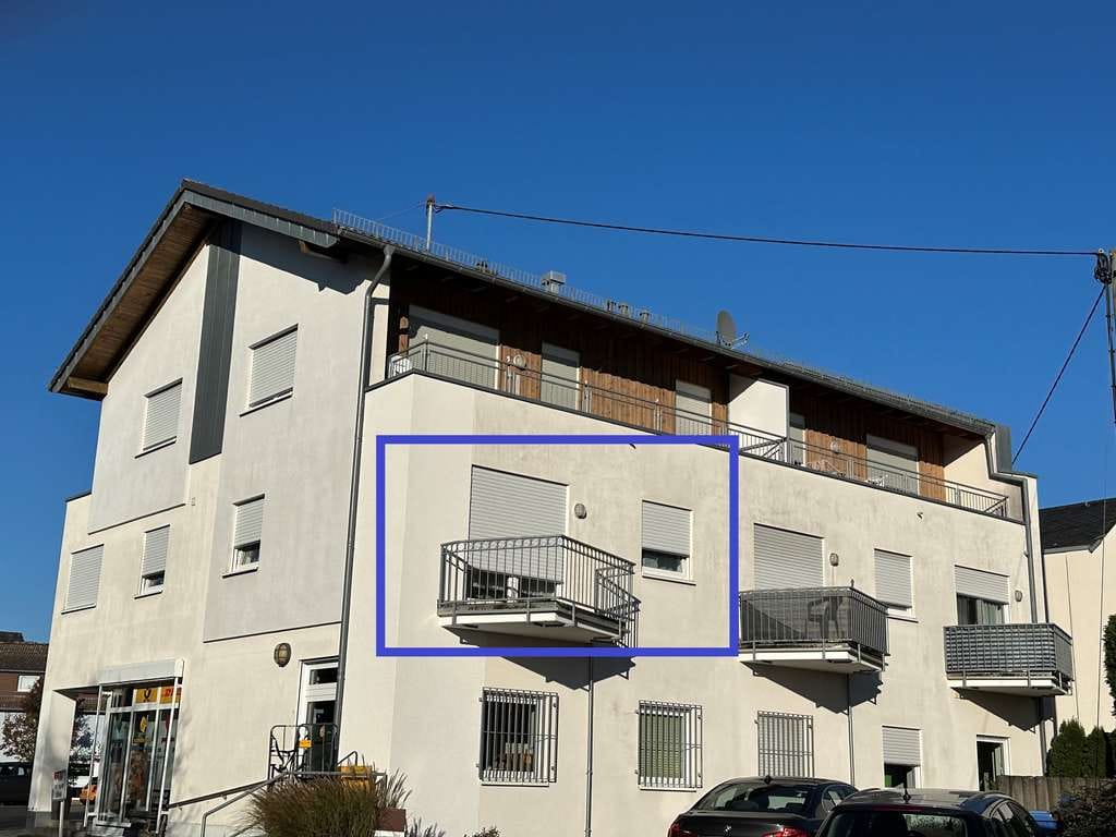 Immobilie in Horhausen (Westerwald) - Attraktive Eigentumswohnung mit Aufzug und Balkon in direkter Ortsmitte von Horhausen - Bild 1