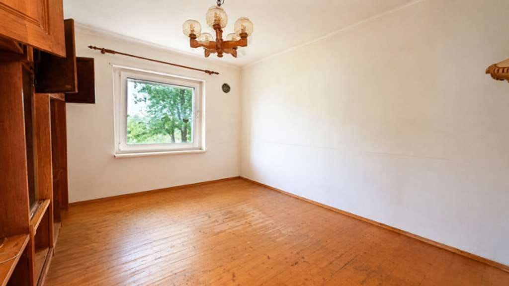 Immobilie in Rammelsbach - Sanierungsbedürftiges Einfamilienhaus mit Garage und viel Gestaltungspotenzial - Bild 1