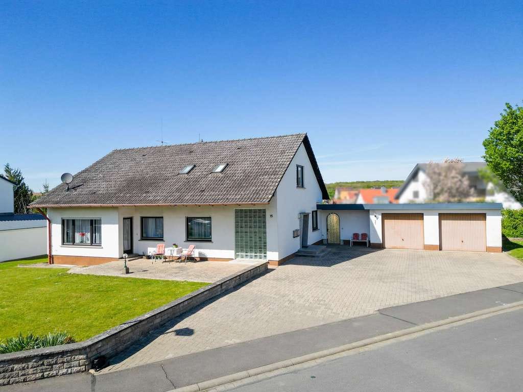 Immobilie in Kirchheim - Wohlfühlen mit Platz und Sonne – Familienhaus mit großem Garten - Bild 1