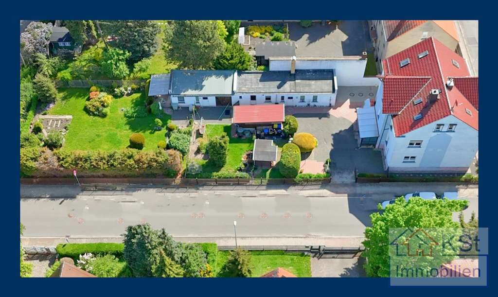 Immobilie in Böhlen - Viel Raum für Ihre Visionen: Gepflegtes Mehrfamilienhaus mit Baugrundstück und weitläufigem Garten - Bild 0