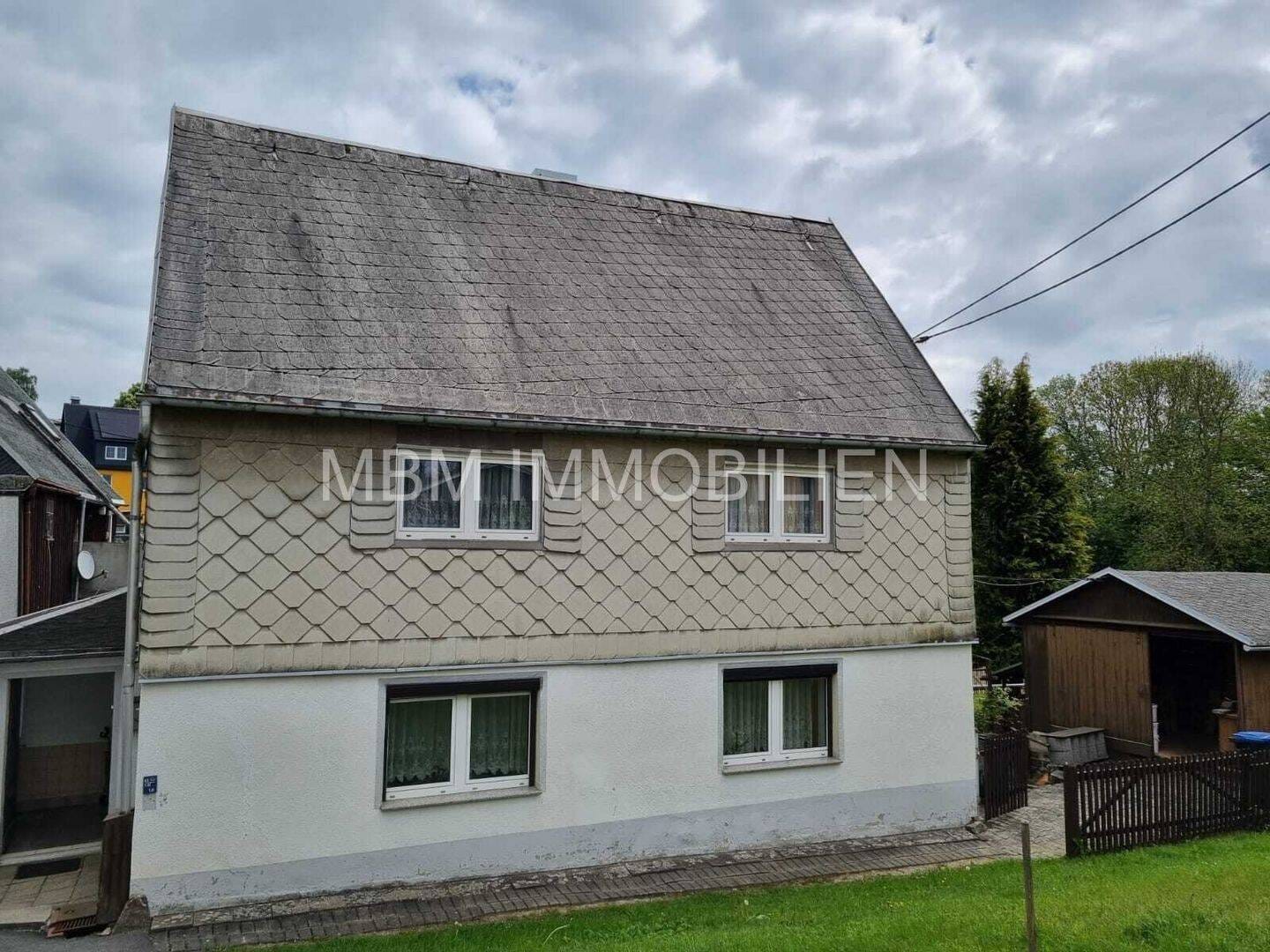 Immobilie in Pockau-Lengefeld - Sanierungsbedürftige Immobilie mit großem Potenzial in idyllischer Lage von Pockau, OT Wernsdorf - Bild 0