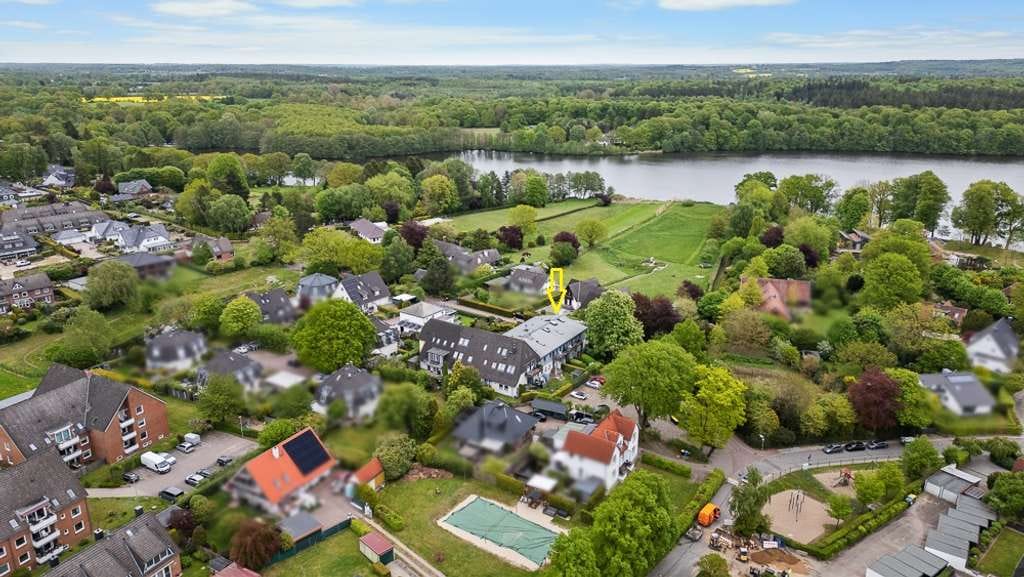 Immobilie in Lütjensee - Wohnen in Seelage - bezugsfreie Eigentumswohnung mit Balkon, Gartenteil und einen Außenstellplatz - Bild 1