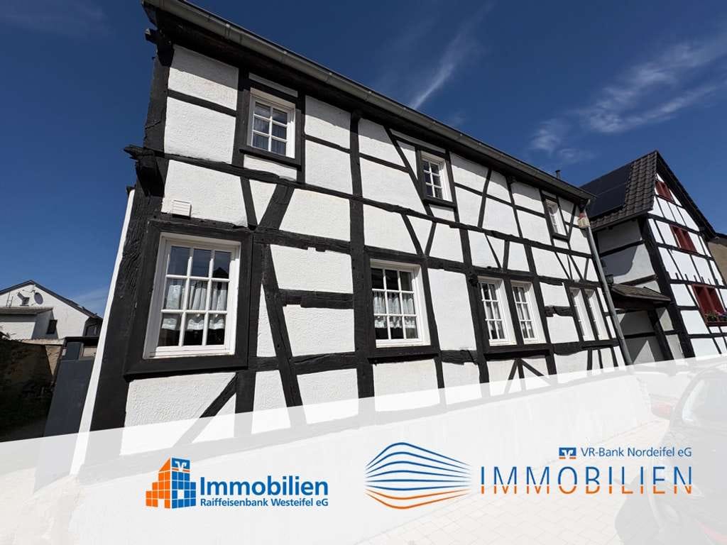 Immobilie in Euskirchen - Einfamilien- Fachwerkhaus mit kleinem Garten, Stellplatz und Garage - ruhige Lage von Kuchenheim - Bild 0