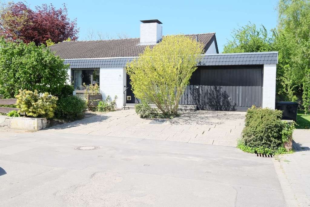 Immobilie in Kranenburg - Individuelles Split-Level-Einfamilienhaus mit gesichertem Mietverhältnis - Bild 0