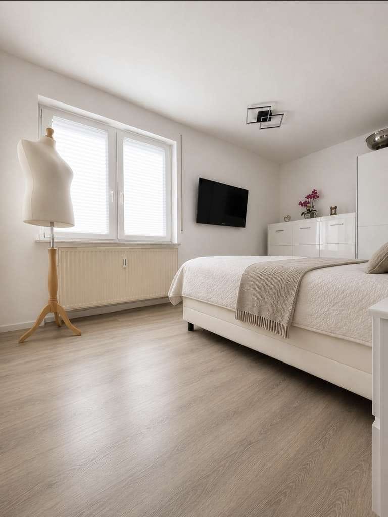 Immobilie in Neuhausen auf den Fildern - Lichtdurchflutetes Wohnglück mit sonnigem Südbalkon in zentraler Lage - Bild 2