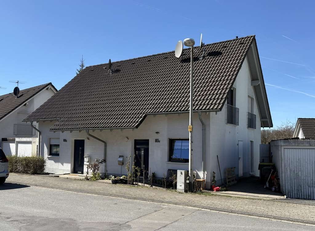 Immobilie in Meinerzhagen - VR Immo: Vermietetes ZFH mit zwei Garagen in beliebter Wohnlage - Bild 1