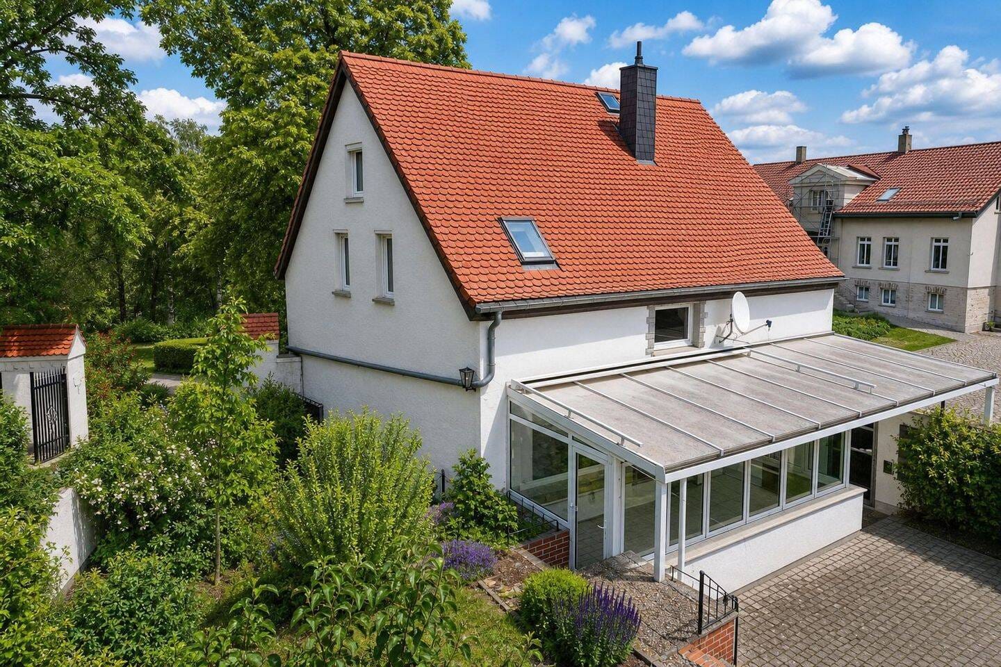 Immobilie in Hohe Börde - Charmantes Einfamilienhaus mit Wintergarten - Bild 1