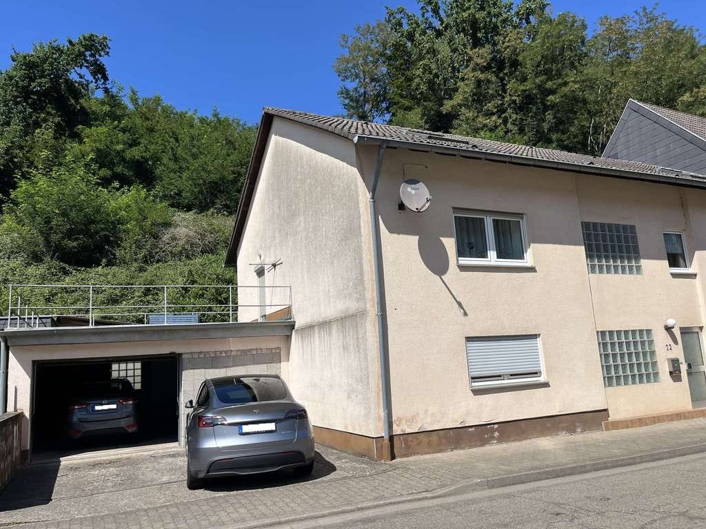 Immobilie in Contwig - GEMÜTLICHES EINFAMILIENHAUS MIT DOPPELGARAGE IN CONTWIG - Bild 0