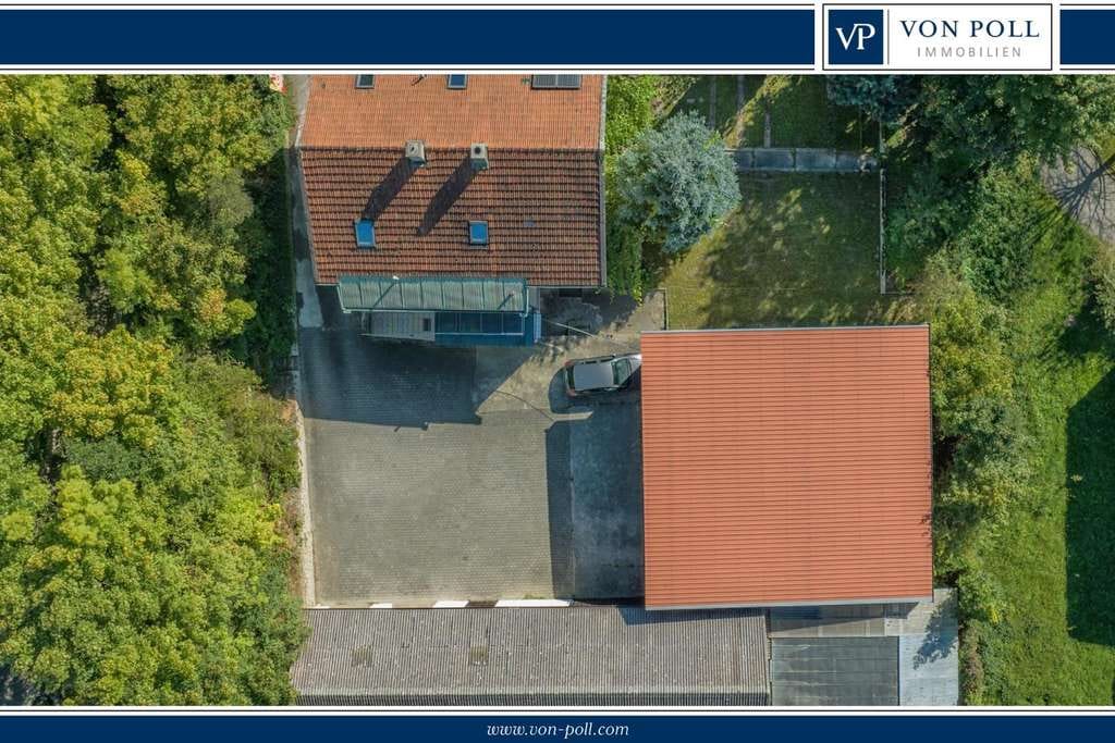Immobilie in Eggenfelden - Großzügiges Zweifamilienhaus mit großem Grundstück und vielseitigen Nebengebäuden - Bild 0