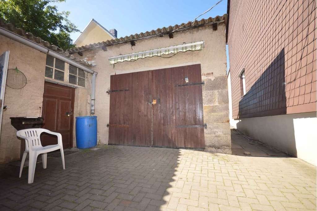 Immobilie in Eilsleben - Historisches Fachwerkhaus mit 3 vermieteten Wohnungen und großem Garten. - Bild 4