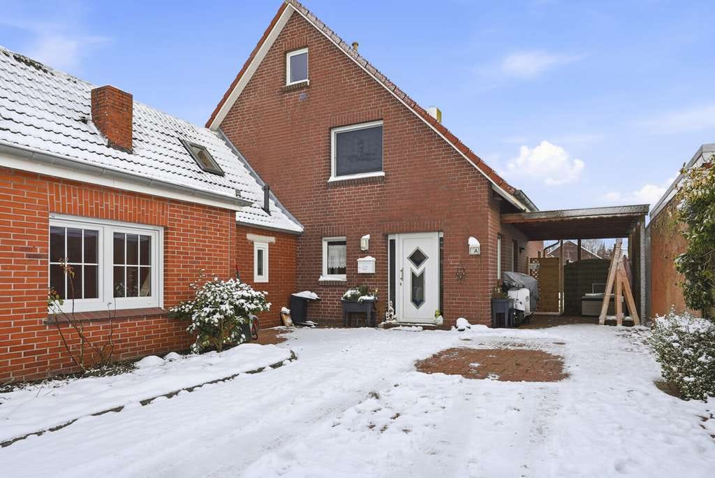 Immobilie in Krummhörn - Raum für Familie und Leben – Angebautes Einfamilienhaus in Feldrandlage - Bild 1