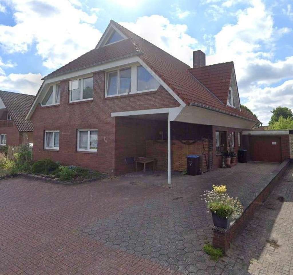Immobilie in Ostrhauderfehn - „Investieren Sie in Geborgenheit: Zweifamilienhaus in familienfreundlicher Siedlung! - Bild 0