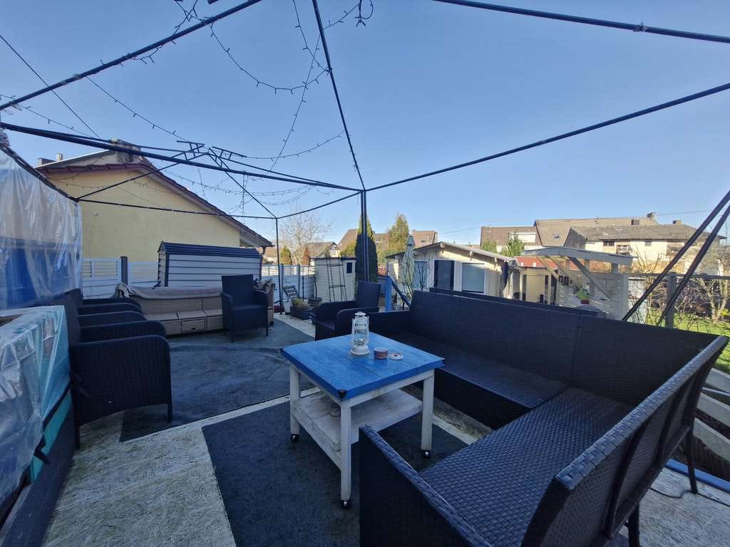 Immobilie in Wadgassen - Charmantes Einfamilienhaus mit Garage und pflegeleichtem Garten - Bild 2
