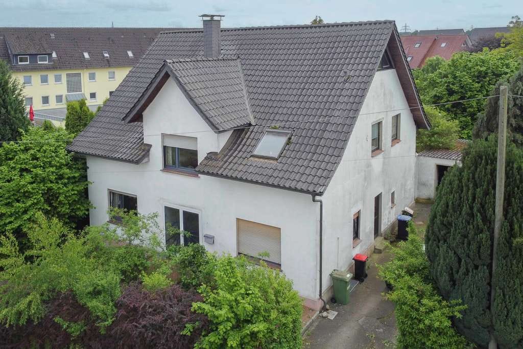 Immobilie in Löhne - Ihr Projekt wartet: Modernisierungsbedürftiges Zweifamilienhaus auf großem Grundstück in Löhne - Bild 0