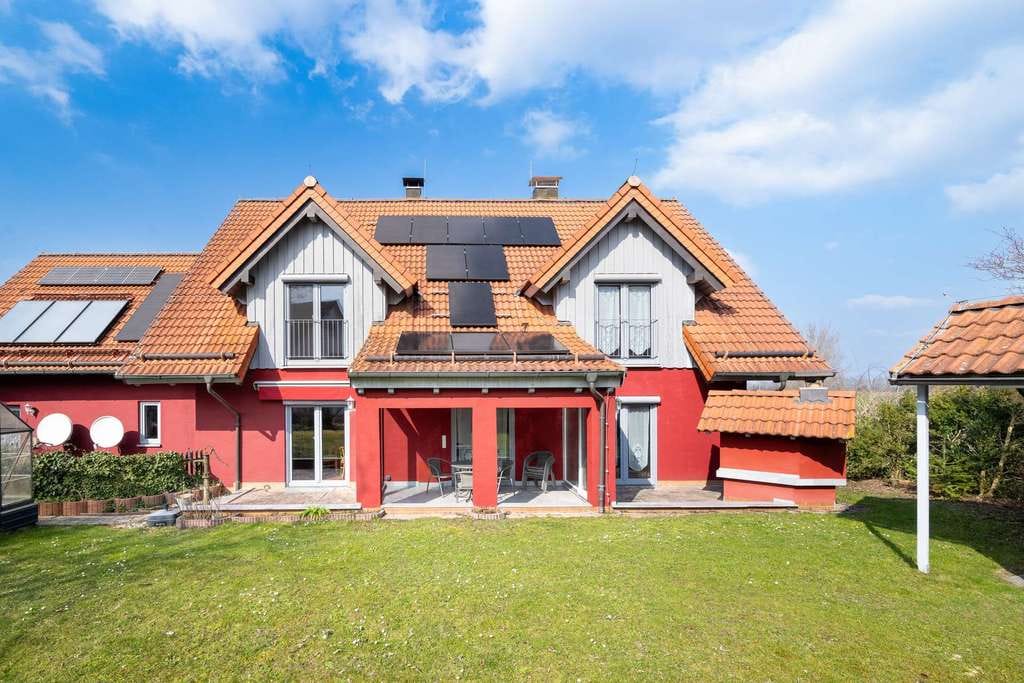 Immobilie in Oberding - Wohnen auf höchstem Niveau in Feldrandlage – EFH mit Einliegerwohnung & modernster Technik - Bild 2