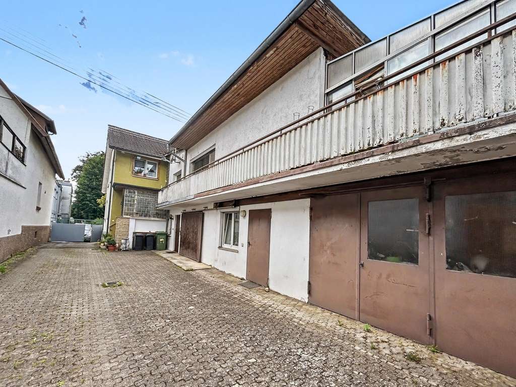 Immobilie in Teningen - Vermietetes Zweifamilienhaus in Teningen-Köndringen - Bild 1