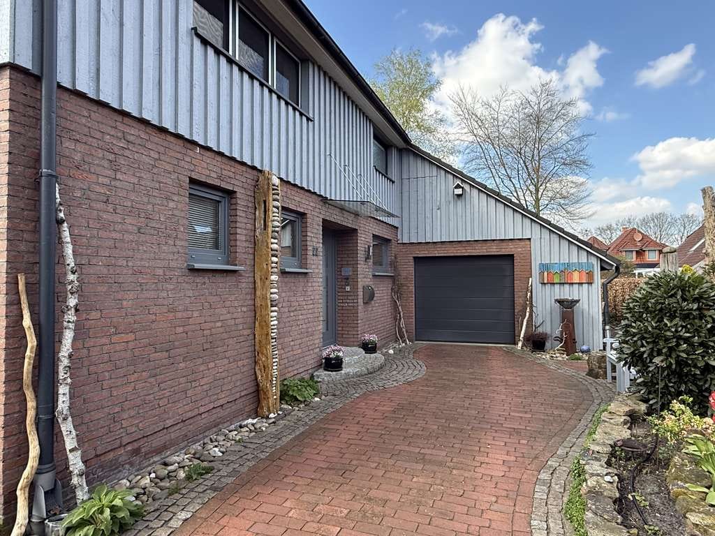 Immobilie in Hude (Oldenburg) - Familienfreundliches Einfamilienhaus mit viel Platz und schönem Garten in ruhiger Lage von Wüsting - Bild 2