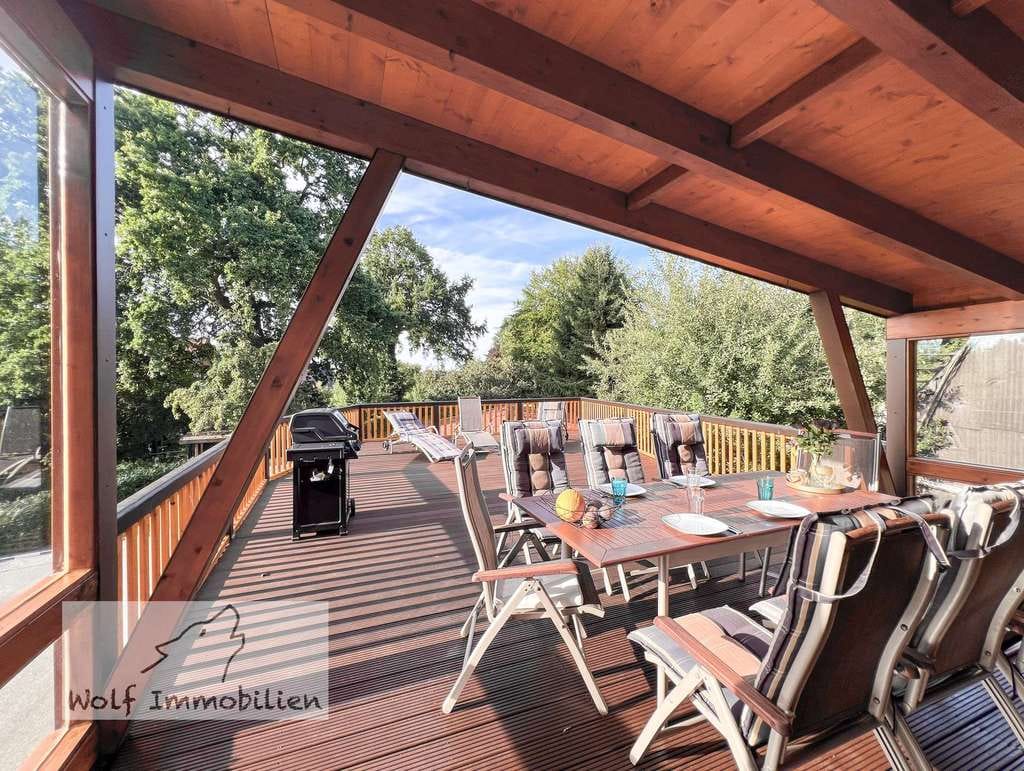 Immobilie in Schiffdorf - ZFH in ruhiger Dorfrandlage mit 1 ha Weide, Pferdestall, PV-Anlage, großer Dachterrasse und Garagen - Bild 1