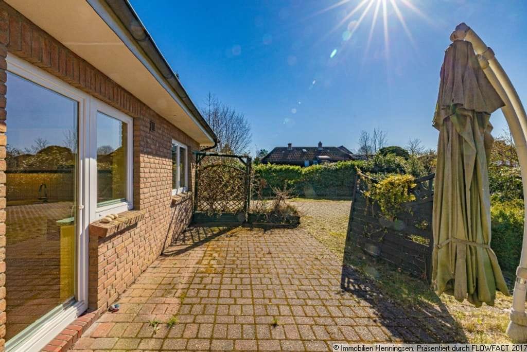 Immobilie in Süderbrarup - Völlig versteckt mitten im Ort - moderner Winkelbungalow mit großem Garten - Bild 4