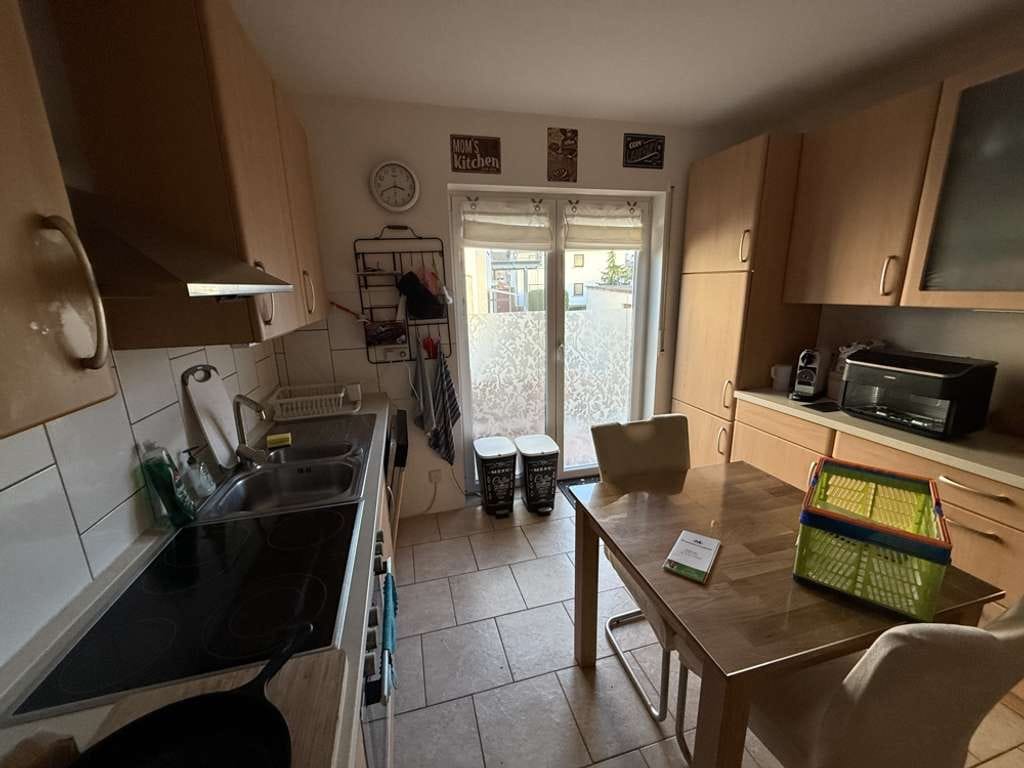 Immobilie in Eggenstein-Leopoldshafen - Attraktive Kapitalanlage: Dreifamilienhaus mit Balkonen & 2 Garagen - Bild 3