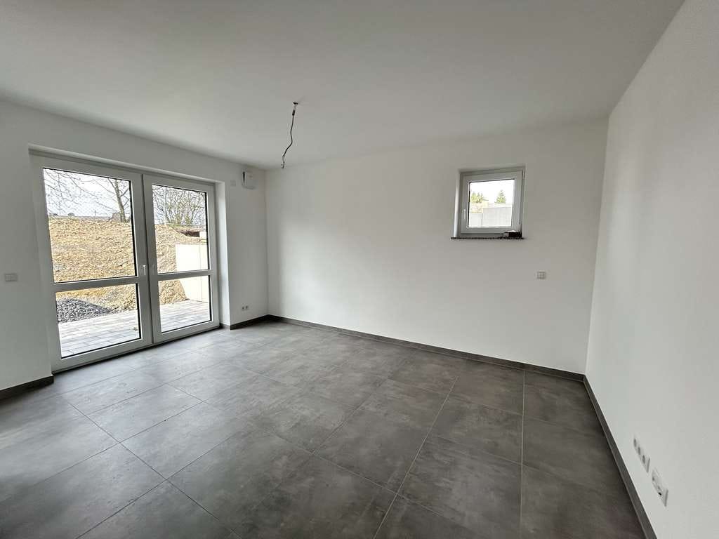 Immobilie in Horhausen (Westerwald) - Horhausen, Souterrain-Eigentumswohnung, Erstbezug, Rollstuhl geeignet, Aufzug,    - Bild 4