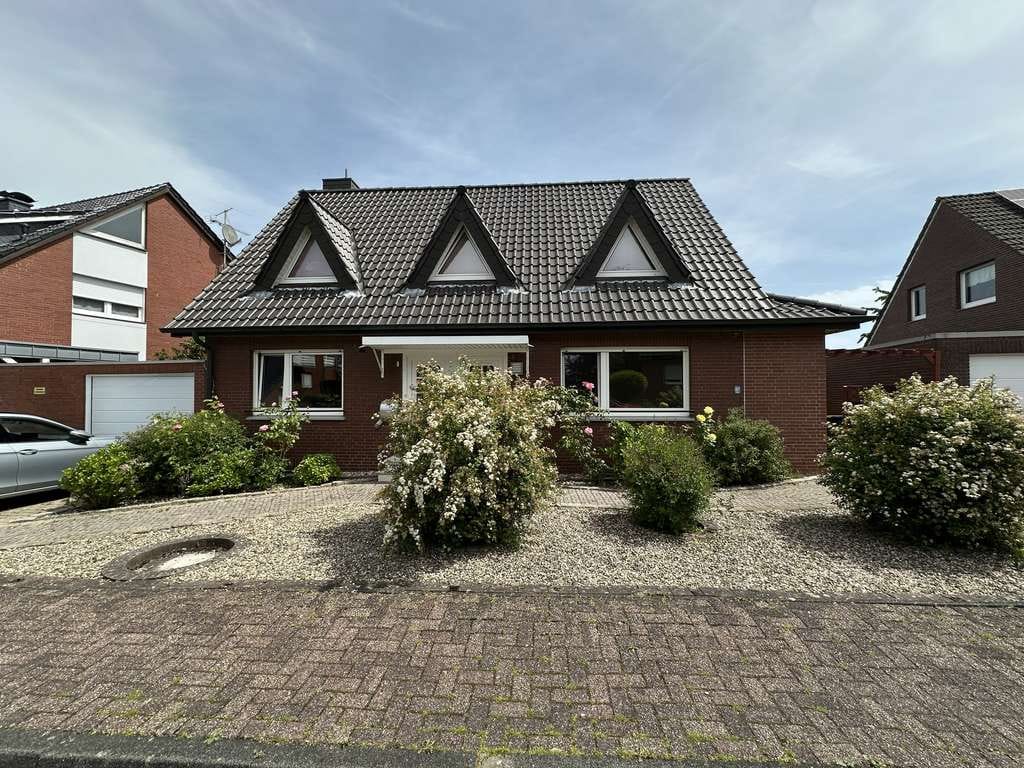 Immobilie in Laer - Wohnen mit Charakter: Einfamilienhaus in Laer mit vermieter Einliegerwohnung - Bild 0