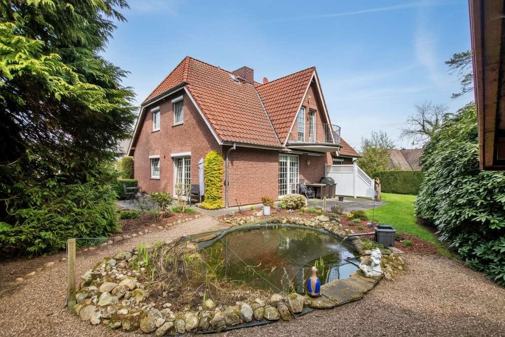 Immobilie in Kirchseelte - Gepflegtes Ein- / Zweifamilienhaus in idyllischer Lage von Kirchseelte - Bild 1