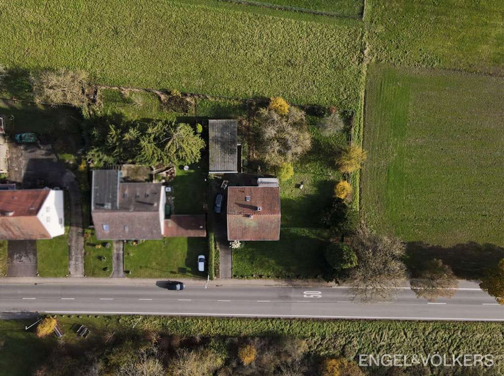 Immobilie in Mandelbachtal - Großzügiges Einfamilienhaus mit Baugrundstück in ruhiger Endlage! - Bild 1