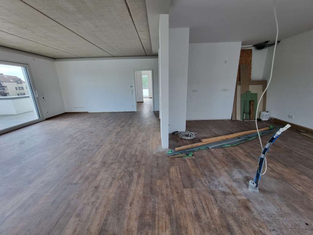 Immobilie in Lembruch - Wohnen, da wo andere Urlaub machen! KfW 55 Effizienzhaus - Penthouse-Eigentumswohnung mit großer Dac - Bild 2
