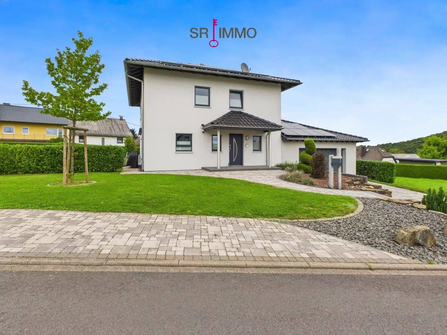 Immobilie in Arzfeld - Wohnen wie neu - stilvolles Einfamilienhaus mit moderner Technik und liebevoll angelegtem Garten - Bild 1