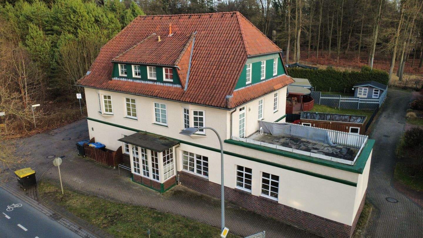 Immobilie in Soltau - Mehrfamilienhaus mit 5 Wohneinheiten und 5 Garagen - Bild 1