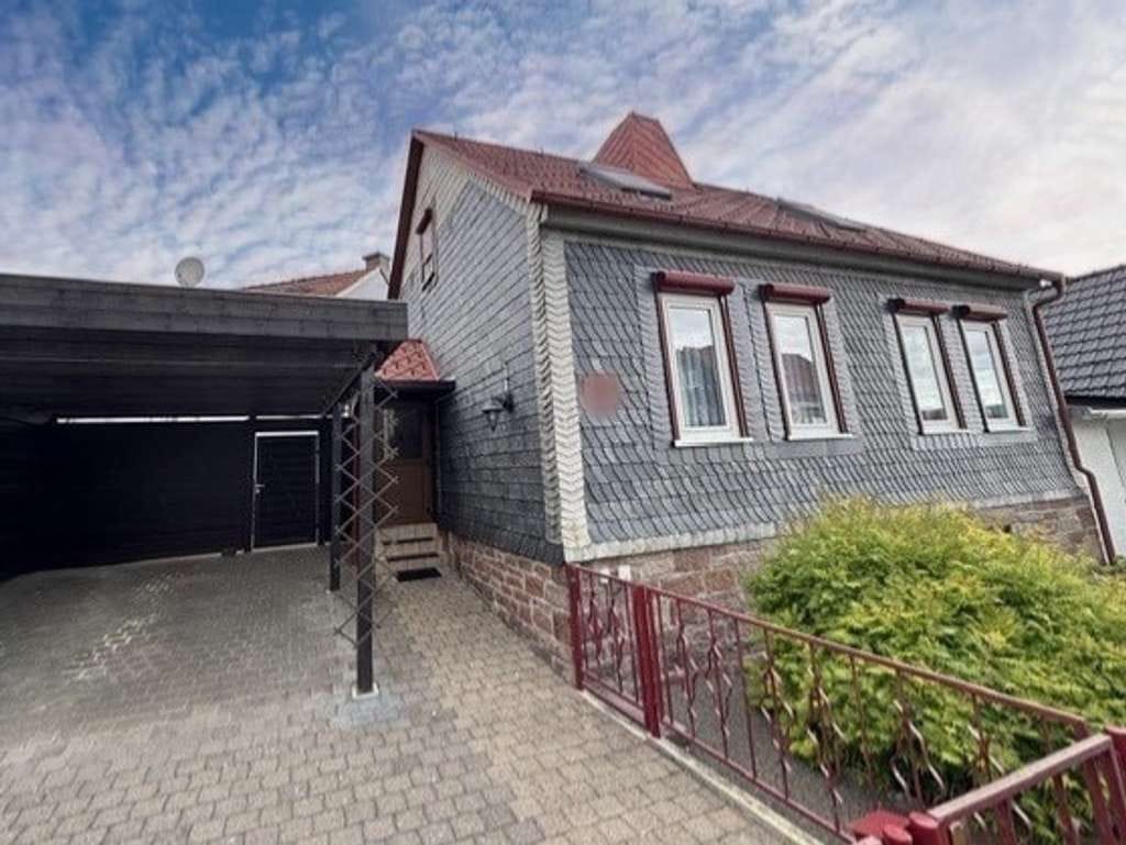 Immobilie in Tambach-Dietharz - Einfamilienhaus mit wunderschönem Garten, Carport, Swimmingpool und Fischteich - Bild 1