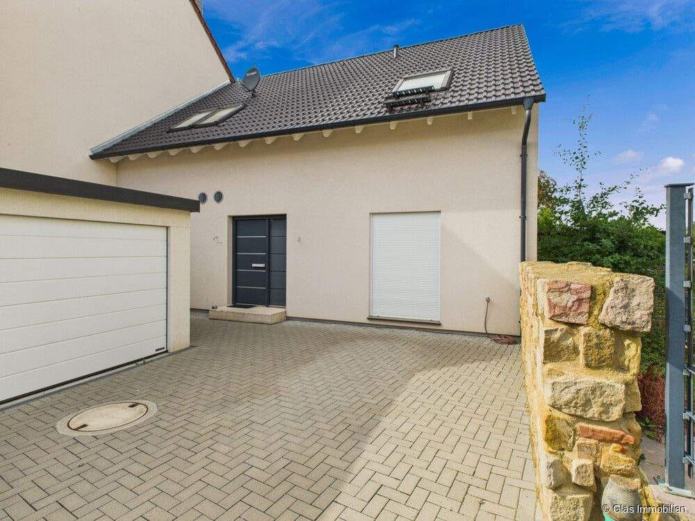 Immobilie in Rödersheim-Gronau - Neuwertiges Einfamilienhaus in ruhiger, sonniger Wohnlage - Bild 2