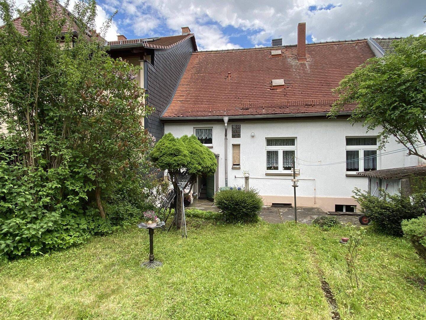 Immobilie in Dornburg-Camburg - Einfamilienhaus mit viel Ausbaupotenzial und großem Garten - Bild 1