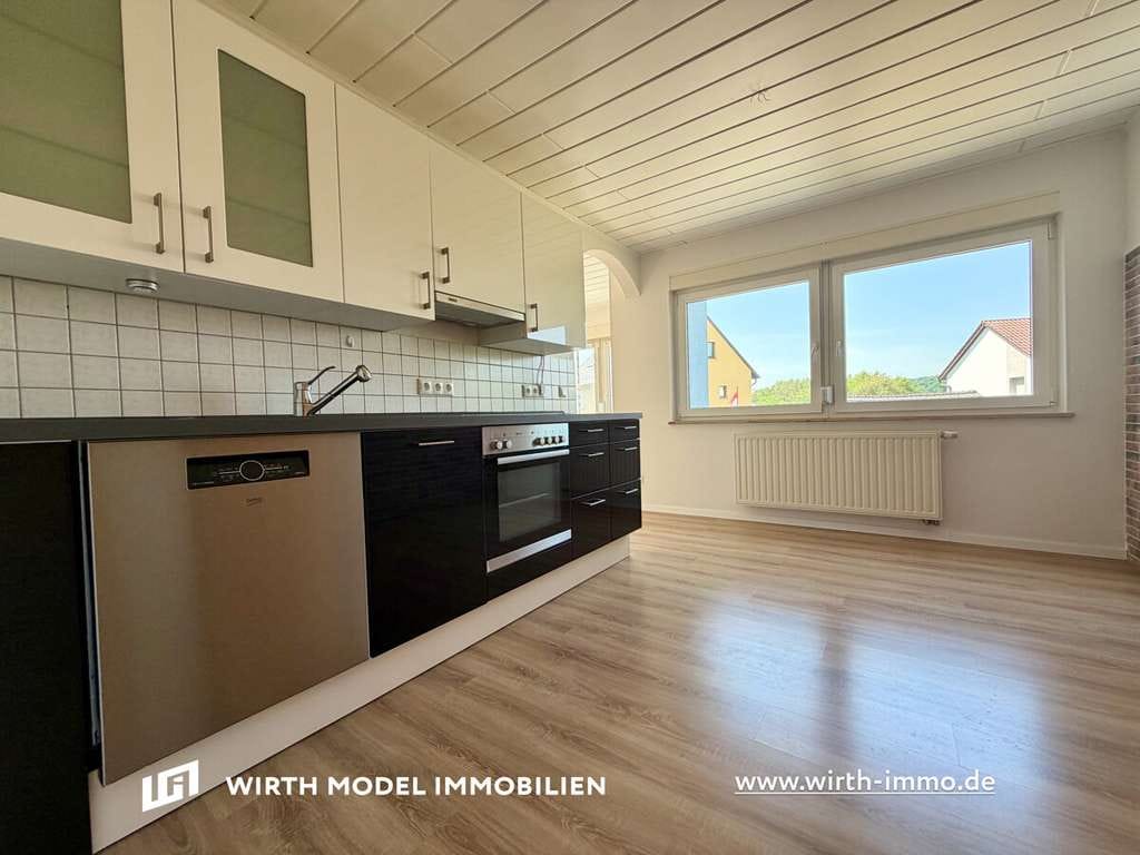 Immobilie in Schonungen - Modernisiertes Zweifamilienhaus mit 2 Garagen und Stellplätzen in Schonungen - Bild 4