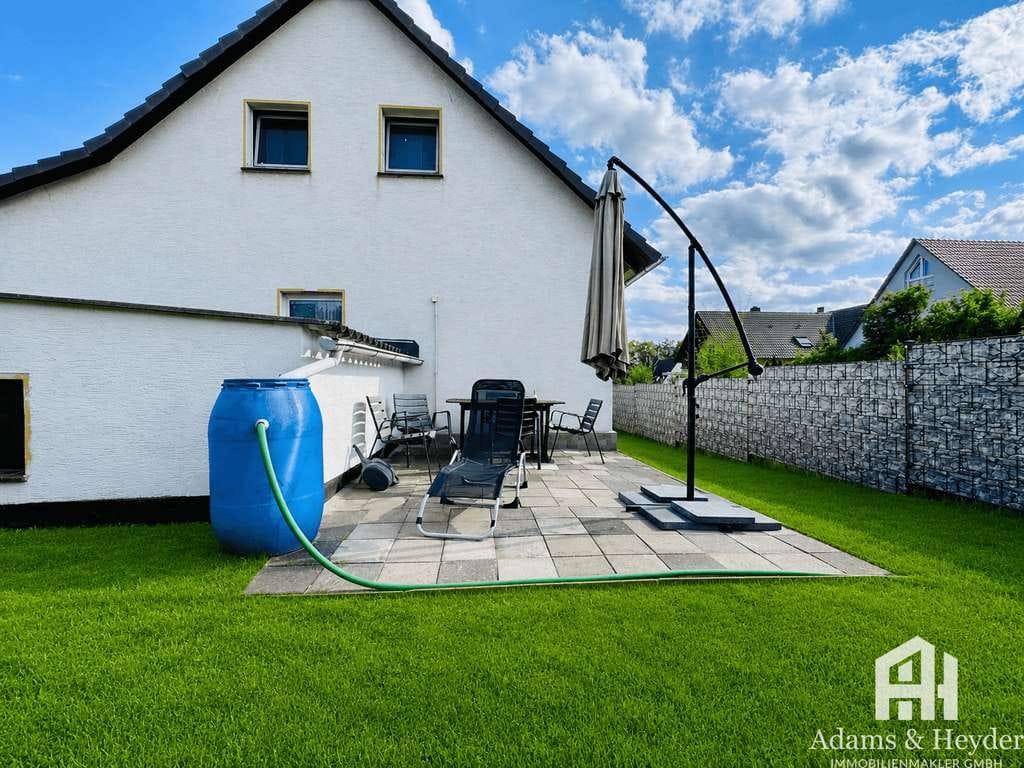 Immobilie in Fritzlar - Familienfreundliches Einfamilienhaus mit Garage, Garten und ausgebautem Dachgeschoss - Bild 4