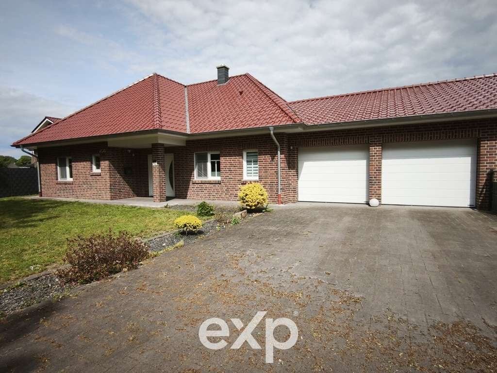 Immobilie in Lindern (Oldenburg) - Moderner Bungalow mit Ausbaureserve, Doppelgarage und traumhaftem Weitblick - Bild 0