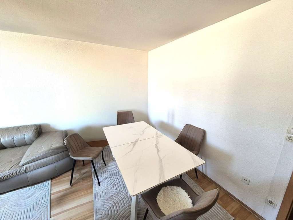 Immobilie in Uhingen - Große familienfreundliche 4-Zimmer-Wohnung mit Balkon und Tiefgaragenstellplatz - Bild 2