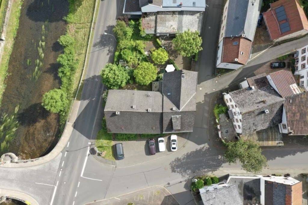 Immobilie in Mürlenbach - Historisches Mehrfamilienhaus mit großem Gartengrundstück, 3 Etagen & vielfältigem Nutzungspotenzial - Mürlenbach - Bild 2