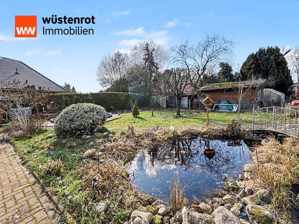 Immobilie in Neubörger - Ausgebauter Bungalow mit Wintergarten, Teich und Pool - Bild 4