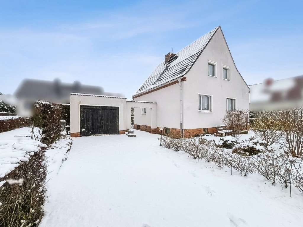 Immobilie in Lohmen - Charmantes und gepflegtes Einfamilienhaus mit Garage in Lohmen unweit von Dresden - Bild 0